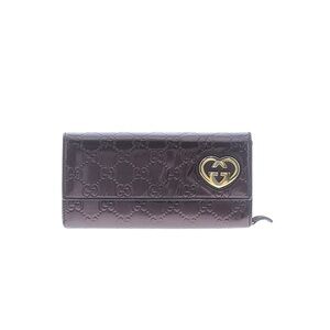 Gucci Embossed Leather Wallet in Plum with Gold Heart GG